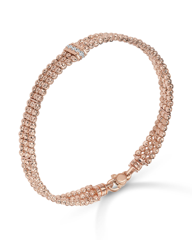 Moon 3 row bracelet in 18kt gold and rubies